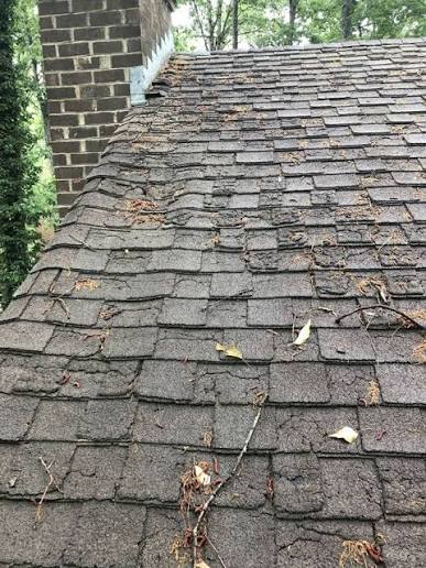 Severely aged and deteriorated asphalt roof shingles