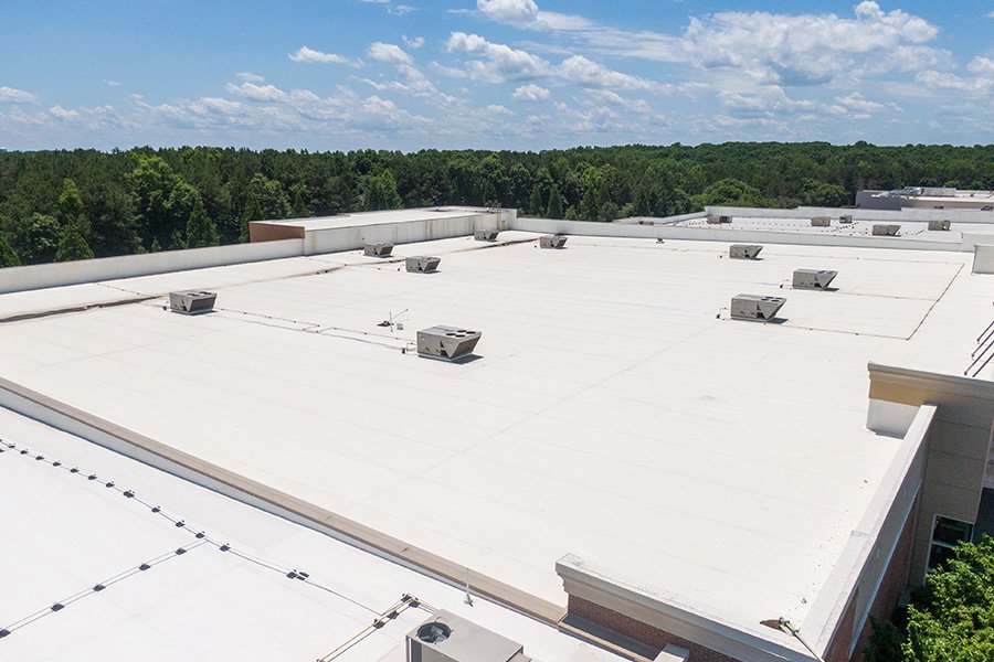 Flat commercial roofing system on a building in Palm Bay FL