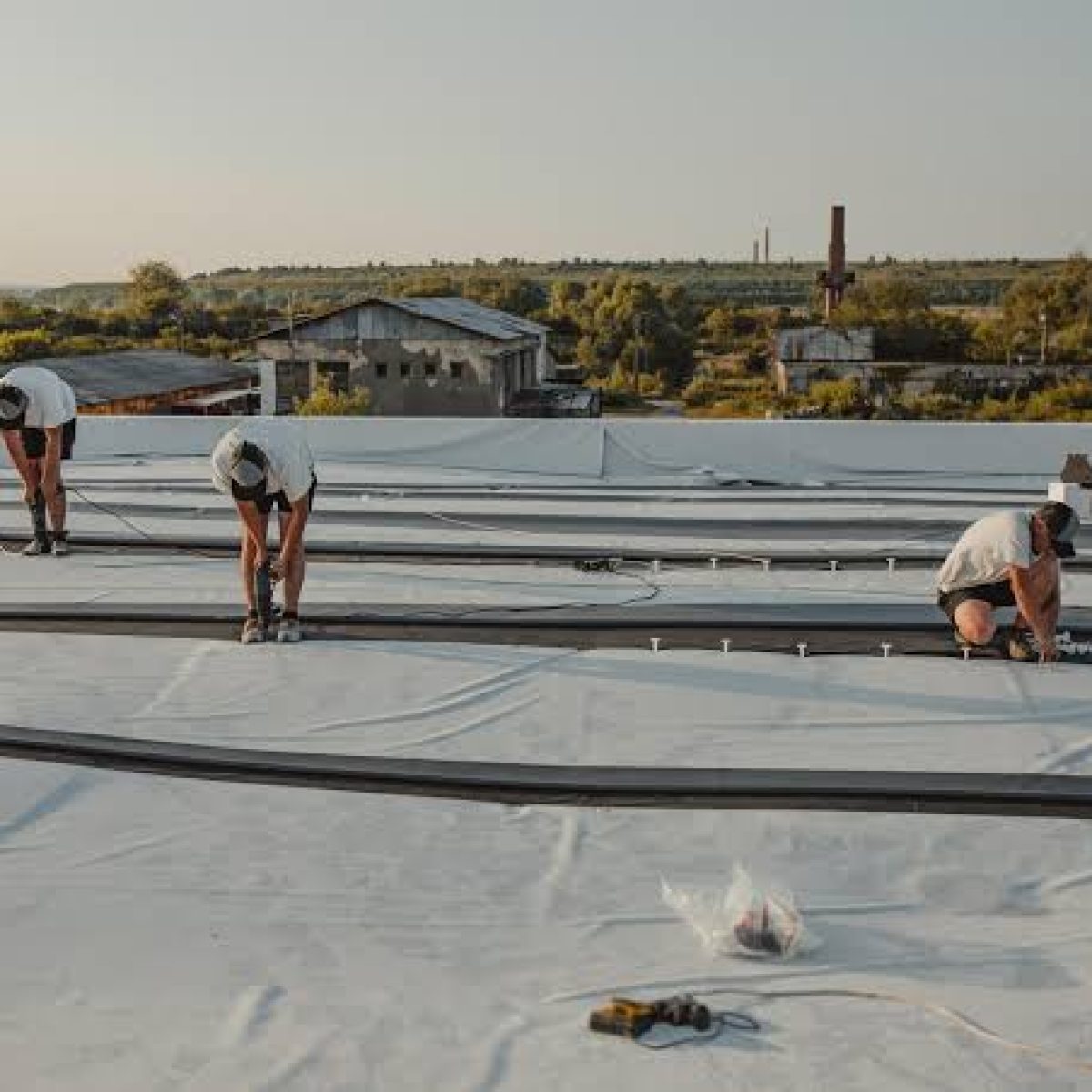 Commercial roof repair on a flat roofing system in Palm Bay FL